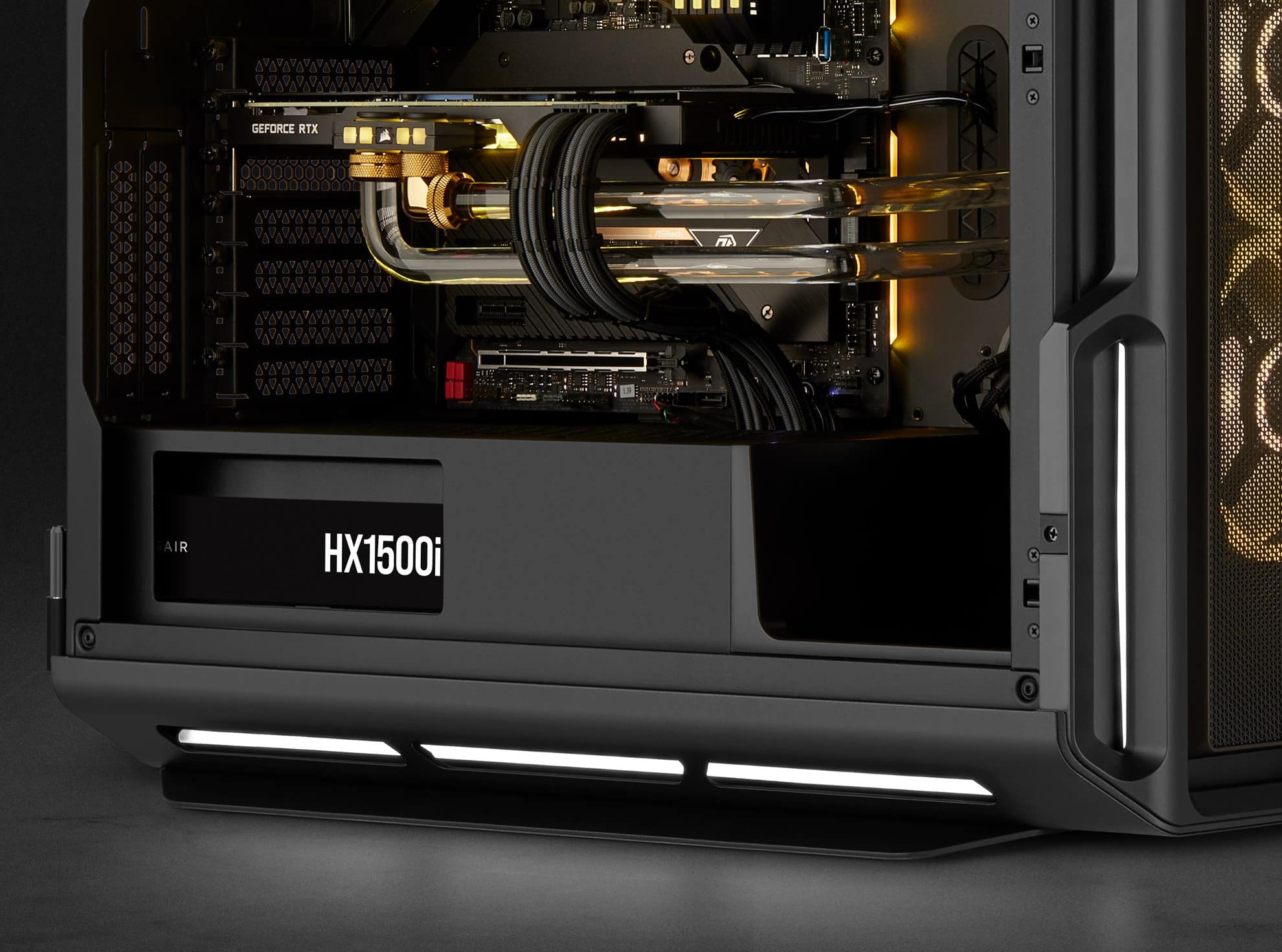 Close up of a top-of-the-line PC with a golden RGB lighting scheme.